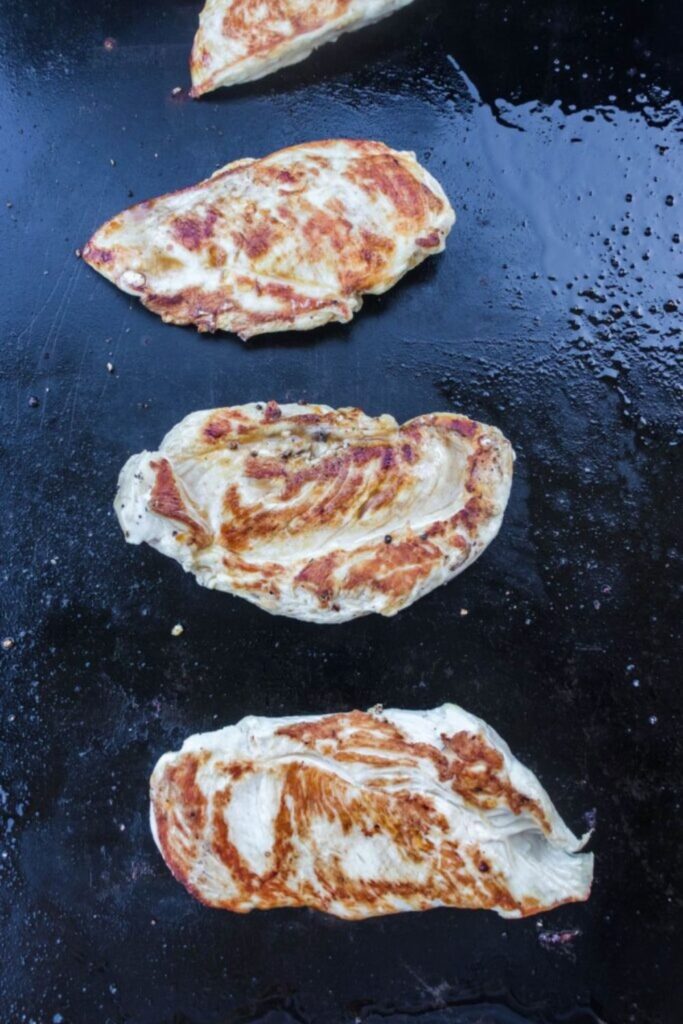 seared chicken breast on blackstone