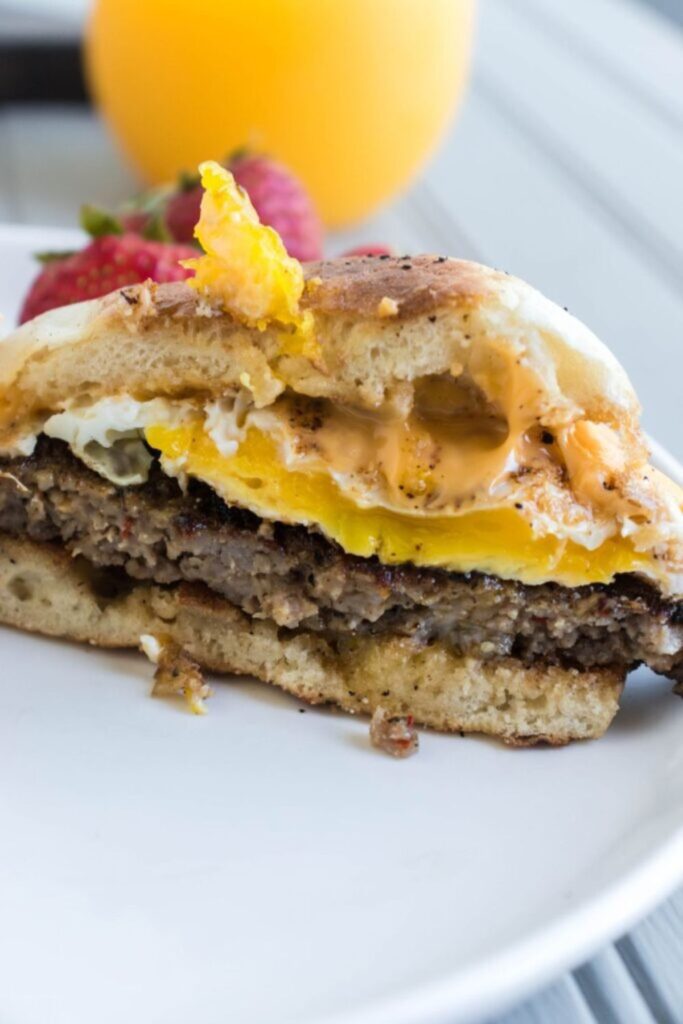 slice of a breakfast sandwich on plate