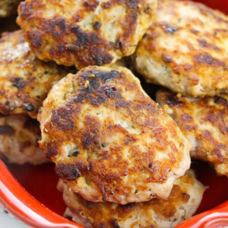 red bowl with sausage patties