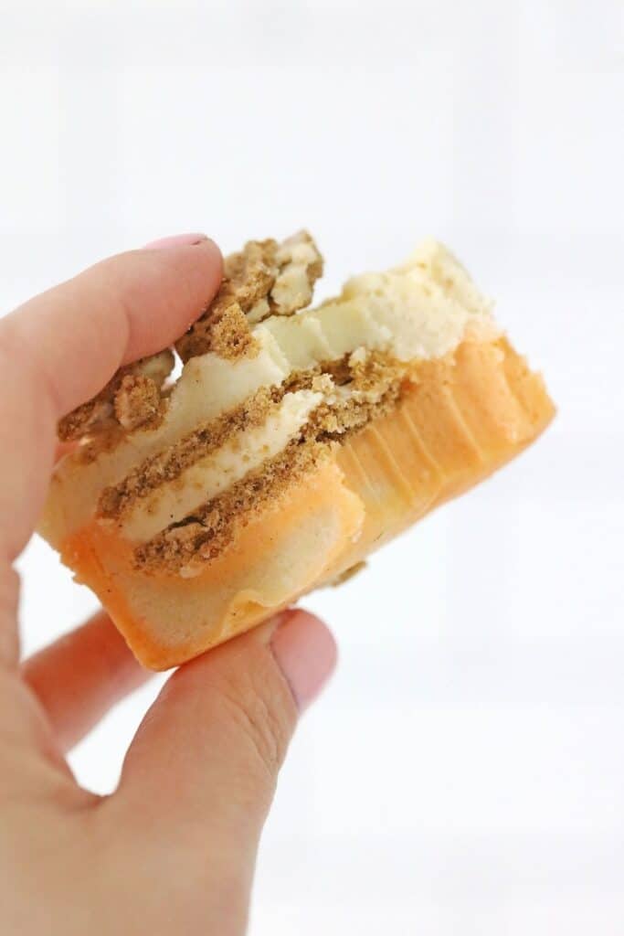 holding a slice of carrot cake fudge in hand