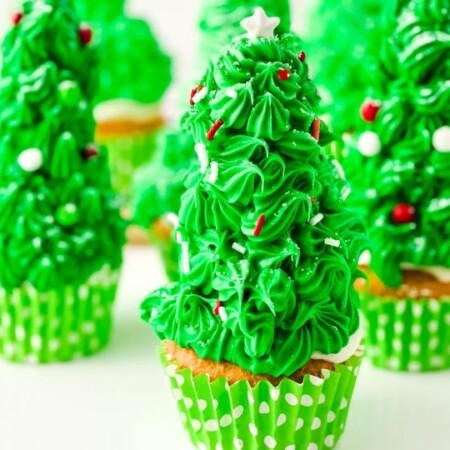 christmas tree cupcakes on counter