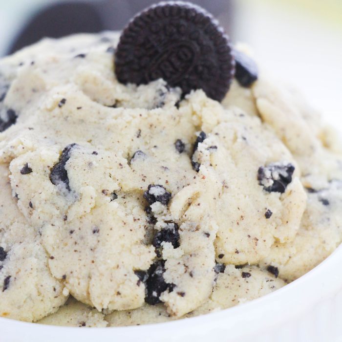 bowl of Oreo cookie dough in a white bowl with Oreo cookie on top