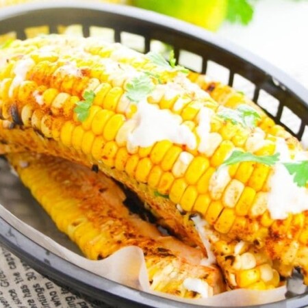 rib corn in a basket on table