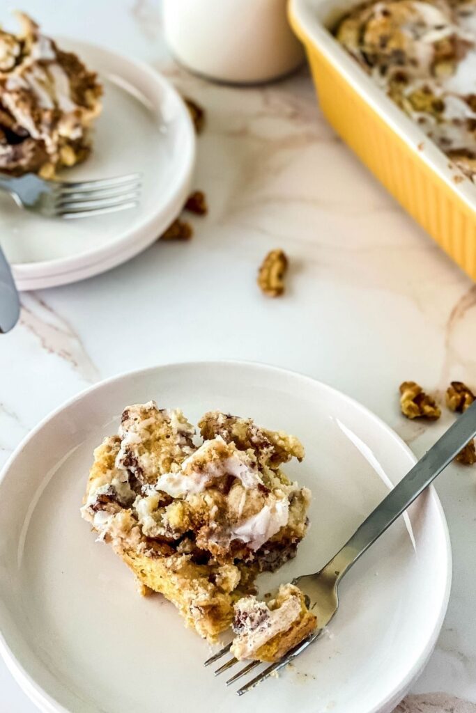 cake on plate with casseerole dish behind it