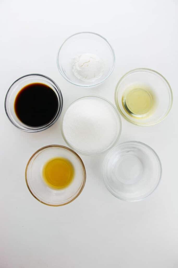 ingredients for kung pao sauce on table in glass bowls