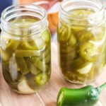jalapeno peppers on wooden cutting board