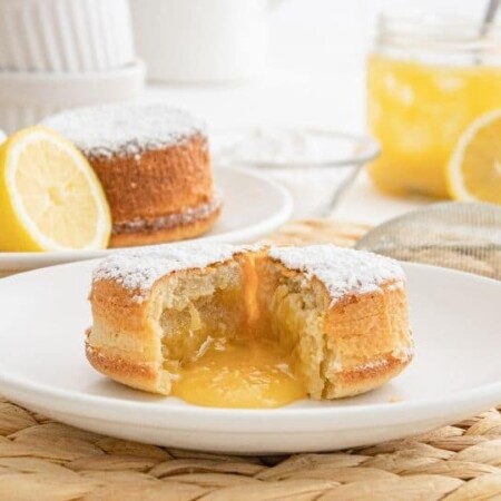 lemon lava cake on plate cut open