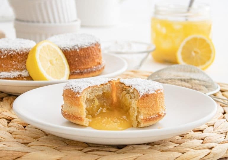 lemon lava cake on plate cut open