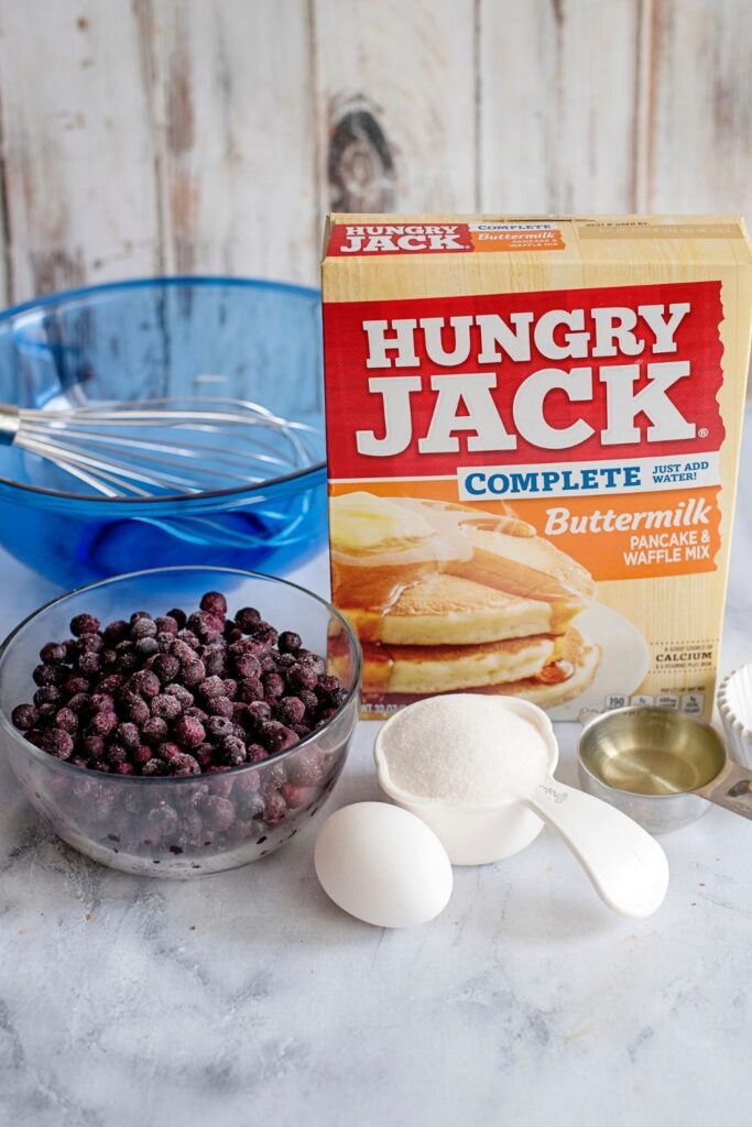 Pancake muffins are an easy muffin that uses pancake mix as the base. This quick blueberry muffin recipe is a hit every single time! Essentially you can mix in any fruit, dried fruit, chocolate chips, and more. A pancake mix recipe that is going to win you over with one fluffy delicious bite.