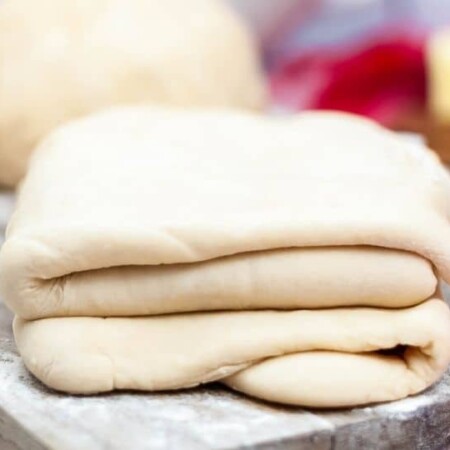 puff pastry on wooden cutting board