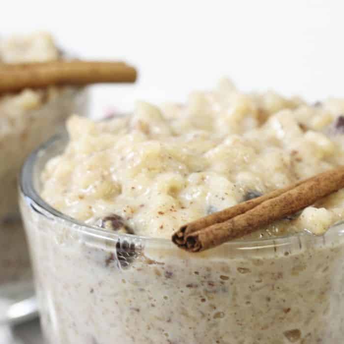 Instant Pot Rice Pudding is the BEST and easiest rice pudding recipe ever. Thick and creamy rice pudding that is loaded with cinnamon and raisins in every bite. #rice #pudding #ricepudding #pressurecooker #InstantPot #whiterice #best #creamy #sweetenedcondensedmilk #dessert #holiday #winter #foodblogger rice pudding recipe