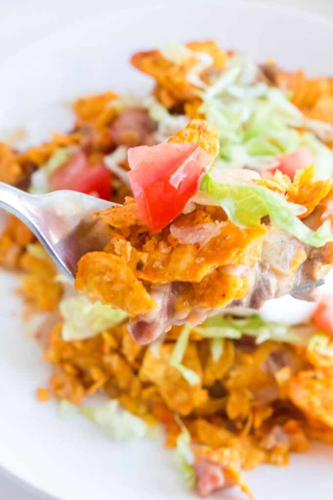fork with some taco casserole on plate and fork