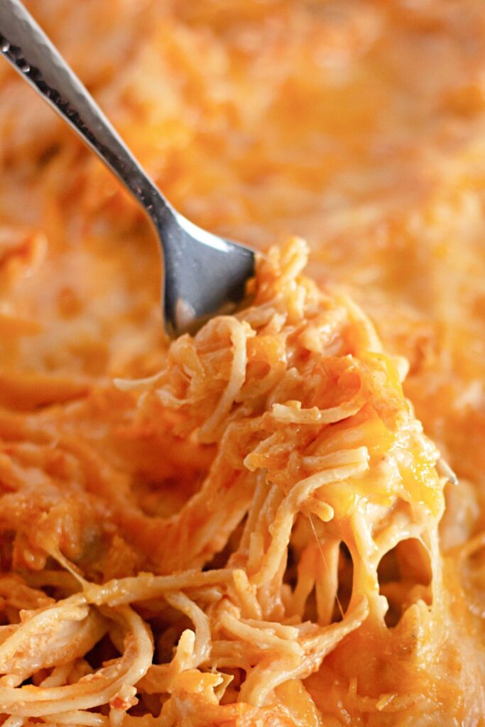 fork with spaghetti sauce twirled on it