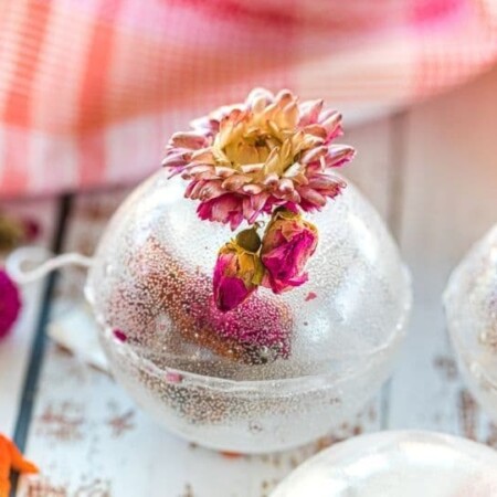 floral tea bomb on the counter with dried flower on top