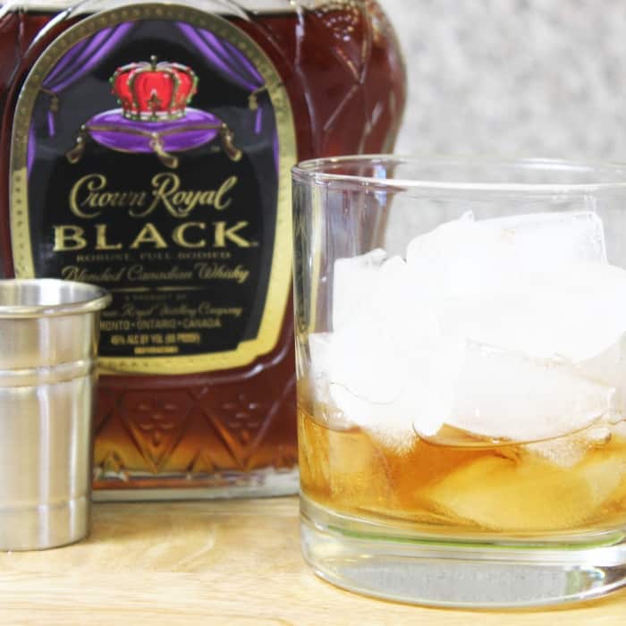 Whiskey and Ginger Ale with a splash of lime is one refreshing adult beverage to whip up in a hurry. Light, refreshing, and bursting with fresh flavors. #crownroyal #whiskey #cocktail #ginger #gingerale #freshlime #recipe #boozy #summercocktail what is whiskey and ginger ale called